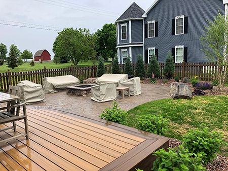 Trex Deck and Paver Patio with a Gas Firepit